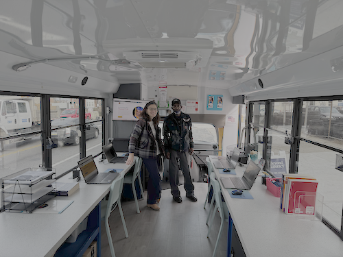 Kieran and Jemal inside the Mobile Computer Lab.